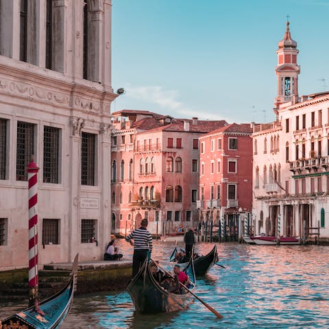 Take a gondola ride around the stunning canals of Venice, with harbours close by