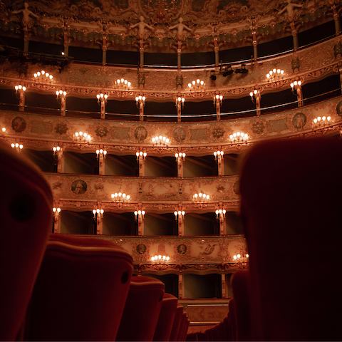 Visit the iconic Teatro La Fenice, an ancient theatre and opera house