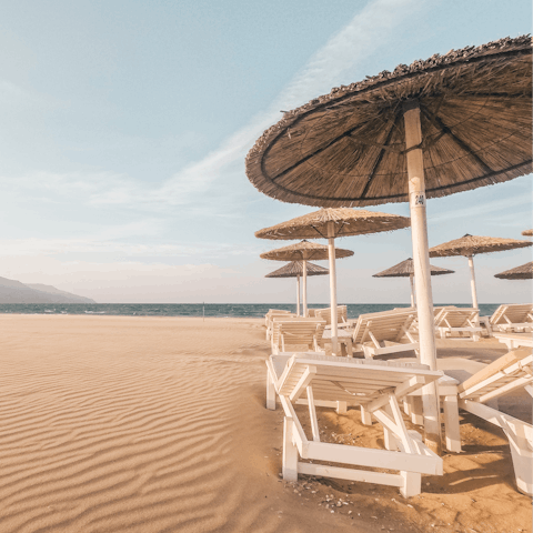 Make a beeline for nearby Almyros Beach