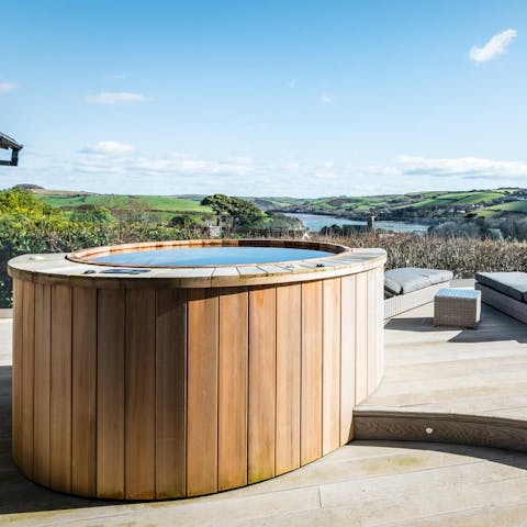 Soak up the sun from the hot tub after a long day of walking