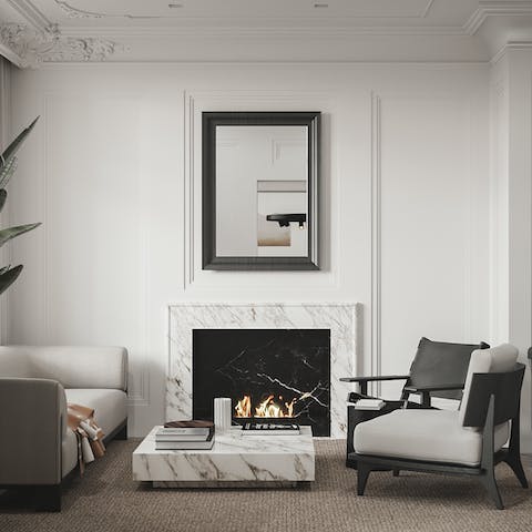 Spend chilly evenings warming up by the marble fireplace
