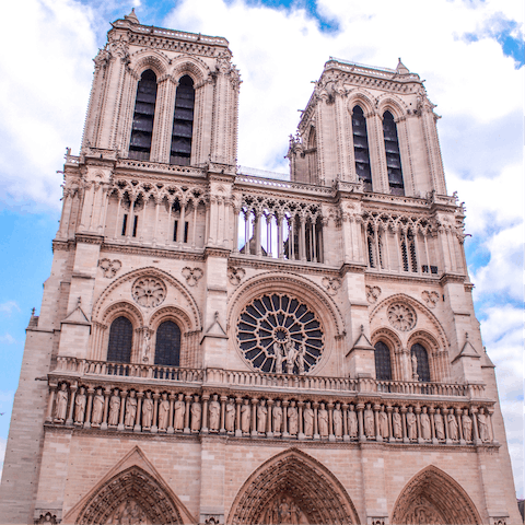 Admire the beauty of Notre Dame de Paris at the other end of a walk