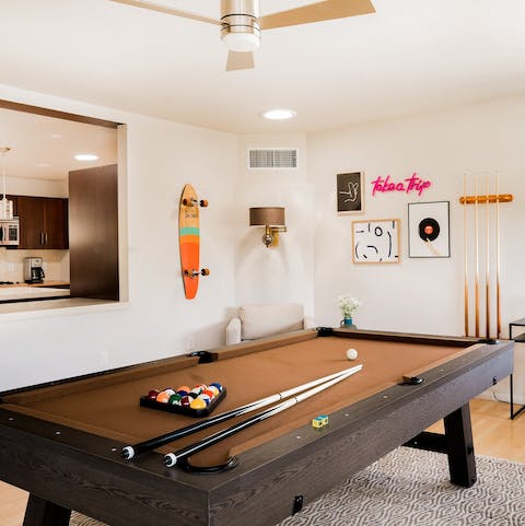 Shoot some frames on the full-size pool table