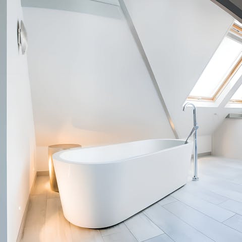 Treat yourself to a soak in one of two freestanding tubs