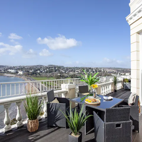 Open the French doors and have breakfast out your beautiful sea view balcony