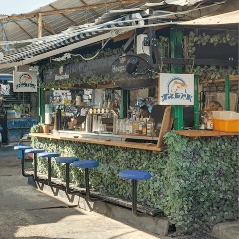 Explore the delights of nearby Carmel Market, where the scent of spices fills the air