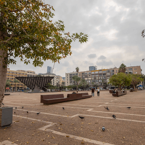 Soak up the sights and sounds of the city at Habima Square, a short walk from home