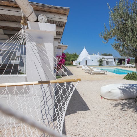 Swing on the hammock while taking in the the blissful Mediterranean beauty that surrounds you  