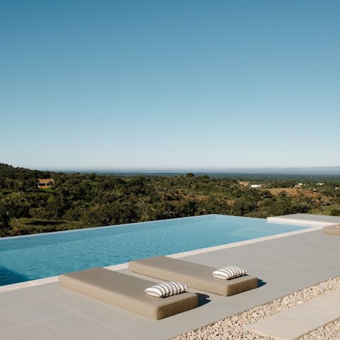 Look out across the horizon as you relax by the pool