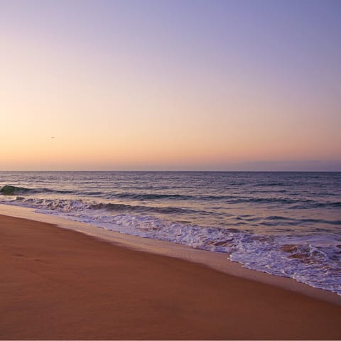 Take the ten-minute drive to the nearby beach for a stunning sunset view
