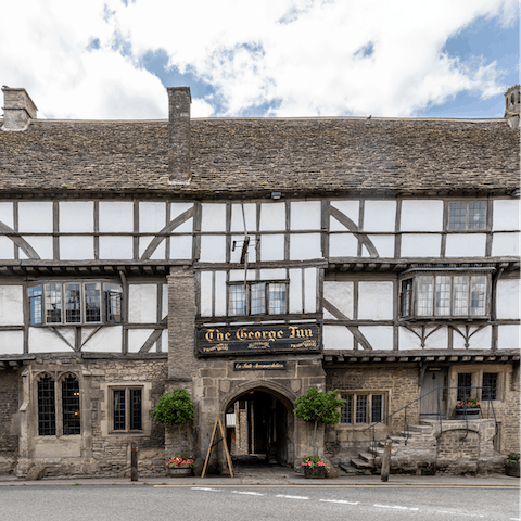 Sip a drink in the one of the country's oldest pubs, right next door