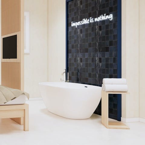 Treat yourself to a relaxing soak in the freestanding tub