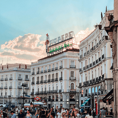 Take a stroll through Madrid's buzzing Puerta del Sol, a short walk away