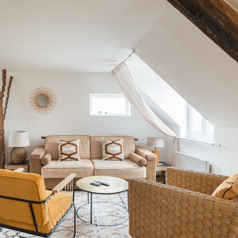 Gather together in your light, bright living area to plan another day of Normandy sightseeing