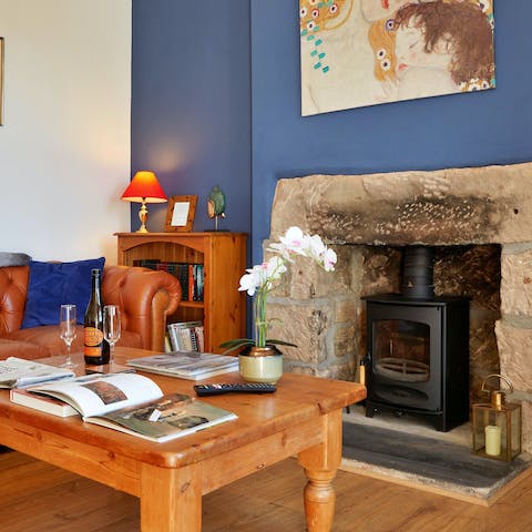Spend cosy evenings sinking into the sofa, catching up on your book beside the glow of the fireplace