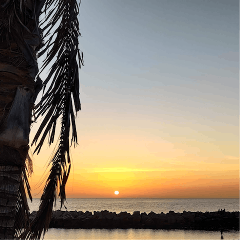 Take a sunset stroll along Playa Flamingo beach, a ten minute walk from the villa