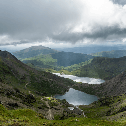 Hike through the unspoiled landscapes of Snowdonia National Park, a short drive away