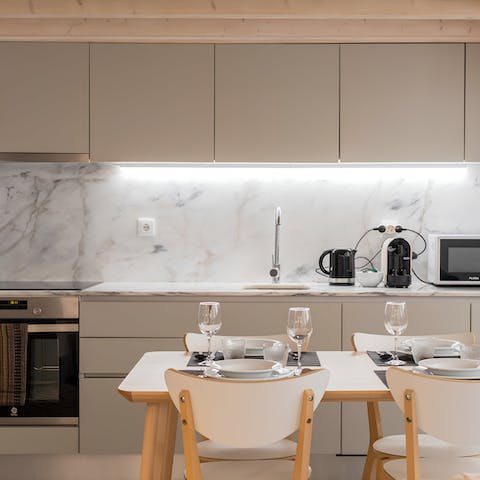 Prepare home-cooked petiscos in the sleek kitchen and dining area