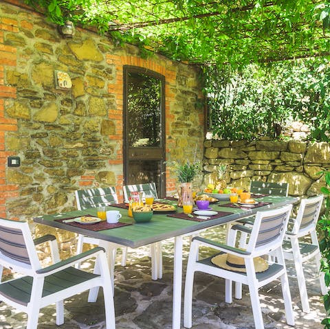Sit down to a feast of Umbrian delights at the alfresco dining table