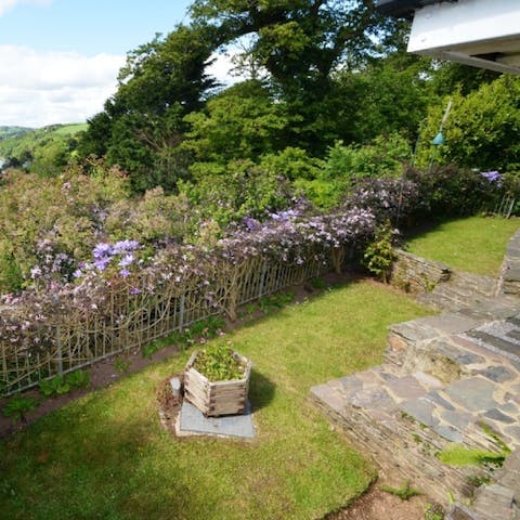 Bring out your book and find a quiet spot out in the home's garden