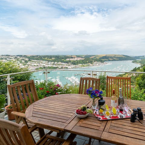 Serve dinner on the alfresco dining table and gaze out at the River Dart