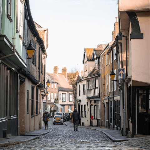 Explore the medieval city of Norwich, an eighteen-minute drive away