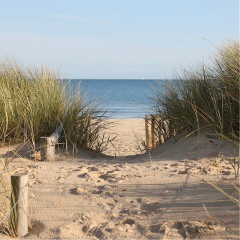 Sink your toes in the sand at Great Yarmouth Beach, thirty-five minutes away by car
