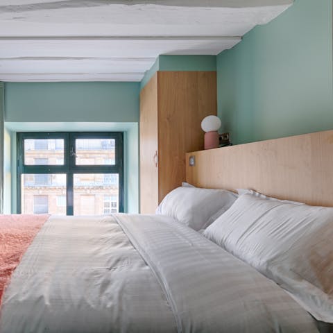 Wake up to 1st arrondissement views from the comfortable upstairs bedrooms