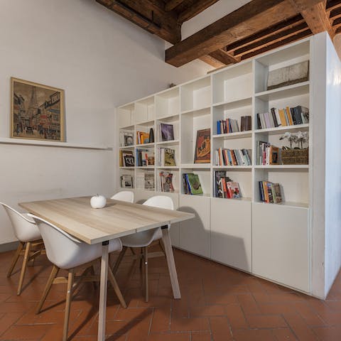 Enjoy espressos and pastries at the table each morning while you peruse one of the books on the shelves