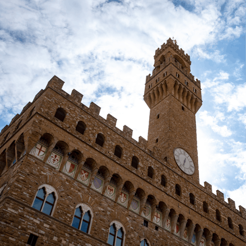 Visit the magnificent Palazzo Vecchio, a short stroll away