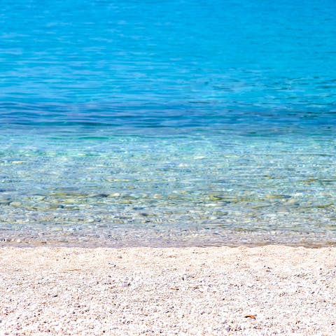 Slap on your sun cream and stroll for just ten metres to Agia Paraskevi Beach