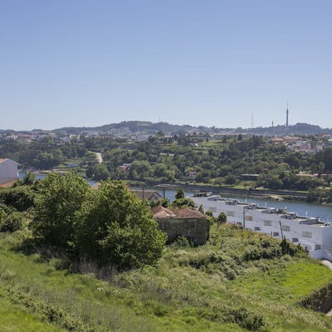 Soak up the lovely landscape and river views from the inviting furnished balcony