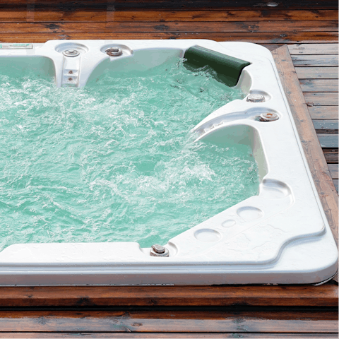 Unwind with a dip in the bubbling hot tub