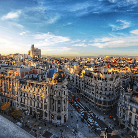 Explore Madrid's architecturally rich streets and sample culinary hotspots along the way