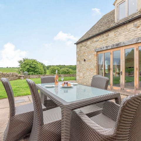 Dine alfresco with incredible views over the fields