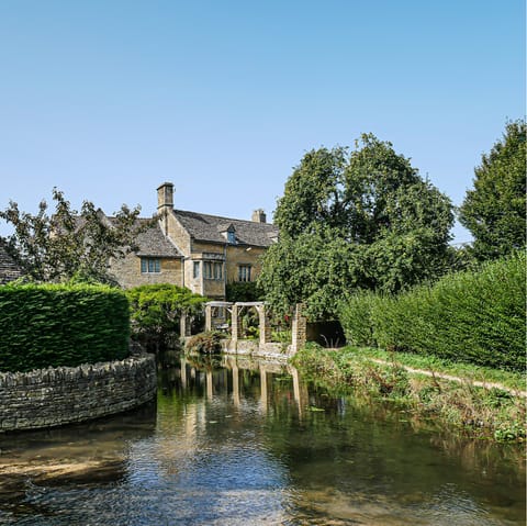 Explore Bourton-on-the-Water – a short eight-minute drive away