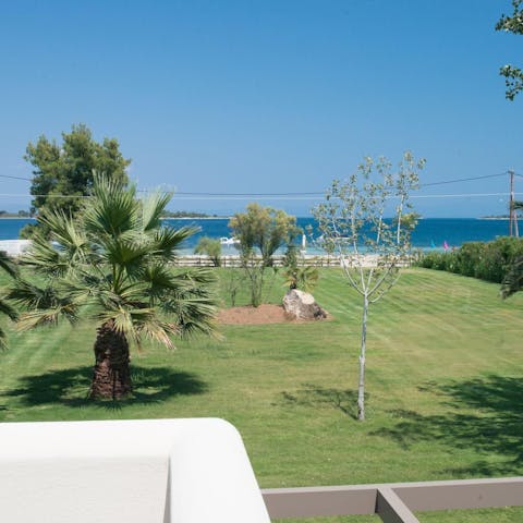 Enjoy a morning stroll through the expansive lawn, overlooking the sea
