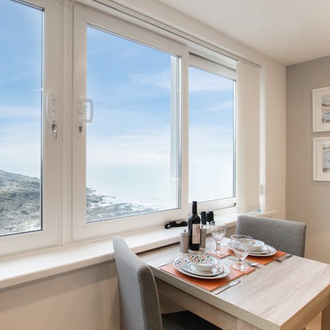 Sit down to an intimate meal while feasting on views of Limeslade Bay