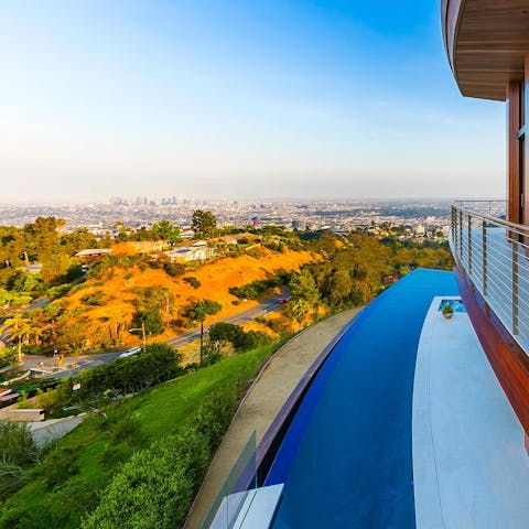 Do laps in the infinity pool with views endless views over the Hollywood Hills