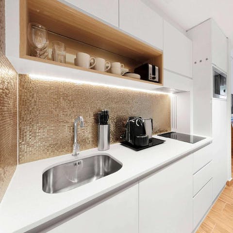 Cook up a quick meal in the sparkling gold kitchen area
