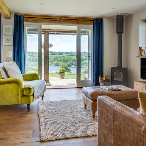 Make the most of the breathtaking views and open the French doors in the open-plan living area