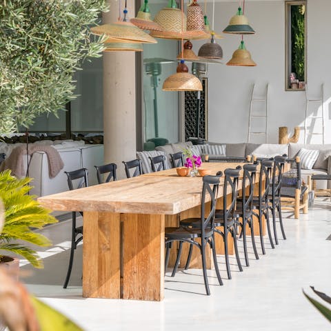 Enjoy a tapas feast at the outdoor dining table for ten