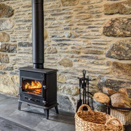 Banish the winter chills with the cosy wood-burning stove in the lounge