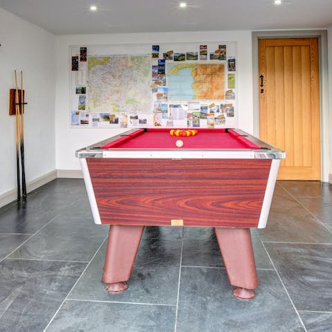 Challenge your friends to a game of pool in the communal games room