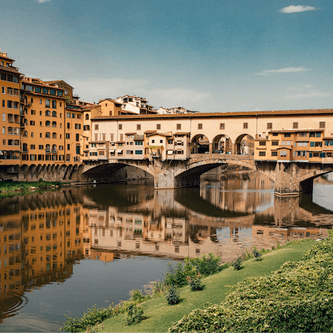 Enjoy a scenic stroll across Ponte Vecchio, also eight minutes away on foot