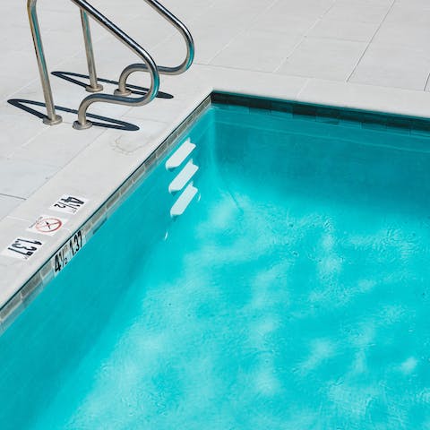 Enjoy a refreshing dip in the private outdoor swimming pool