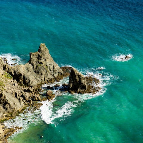 Stroll six minutes to Praia da Luz and swim in front of the famous Rocha Negra