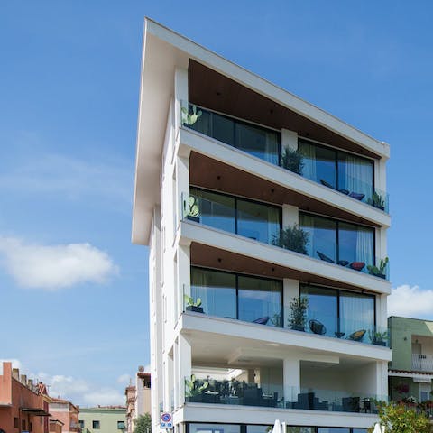 Give contemporary Sardinia living a whirl at this new-build apartment building