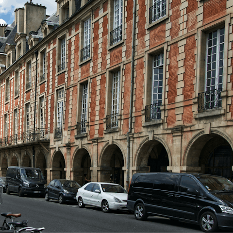 Explore the Place des Vosges, a walk or short ride away 