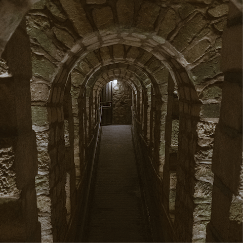 Pluck up the courage to explore Les Catacombes de Paris – they're just a short walk away
